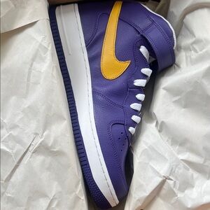 Nike Purple High-Top Sneaker with Yellow Swoosh and White Accents
